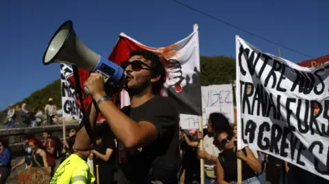 France-Wide Protests Break Out Against Spending Reductions
